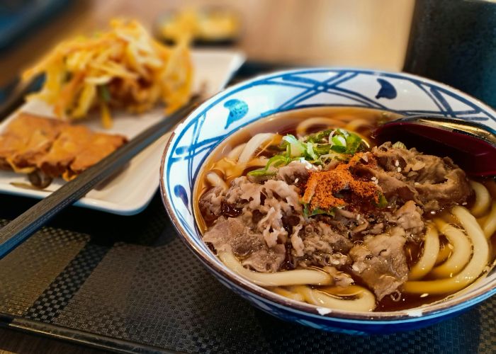 A serving of udon and tempura at Marugame Seimen,